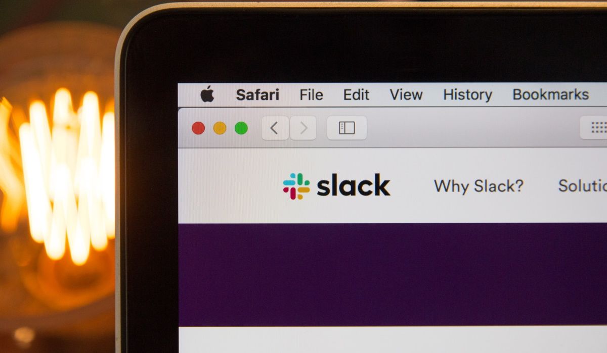 A computer monitor showing the Slack logo
