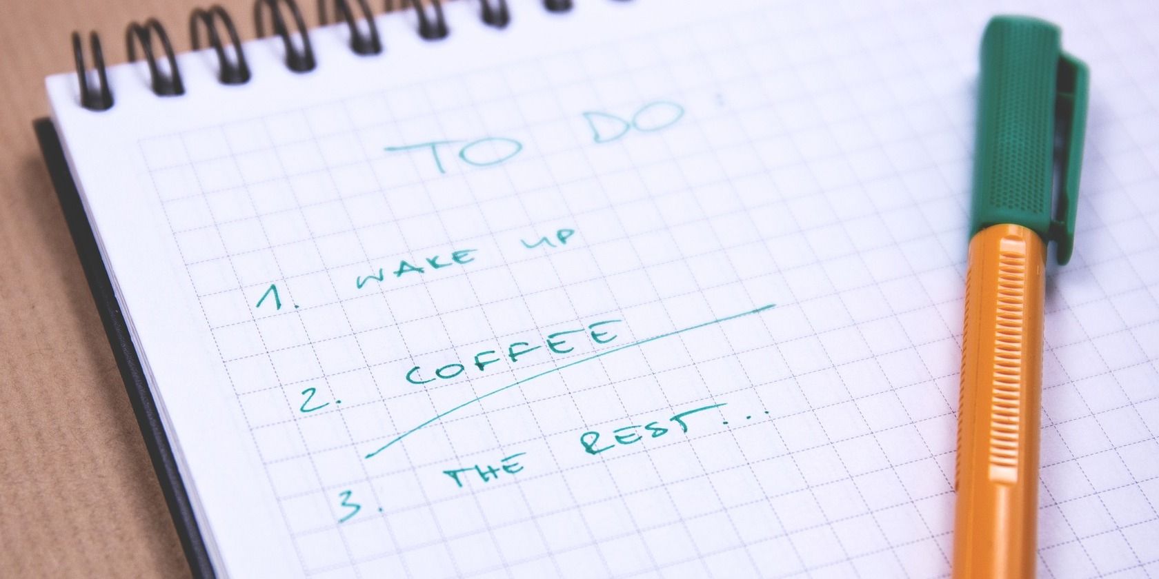 Image showing a notepad with a to-do list and a pen
