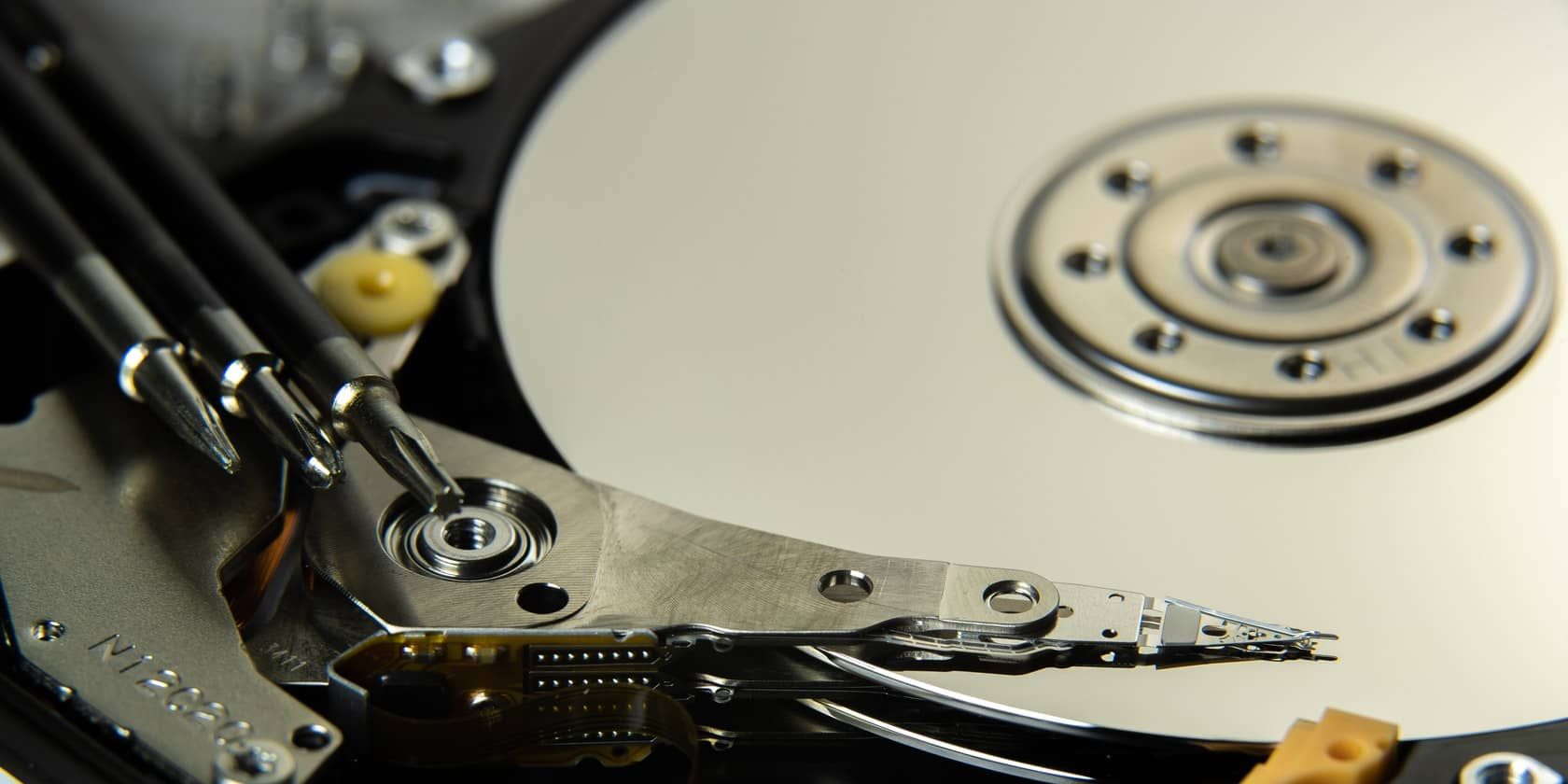 close-up of hard disk drive platters and head