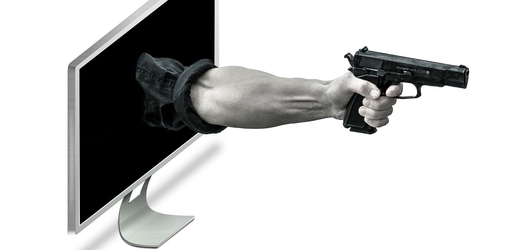 Hand breaking through a laptop screen with gun