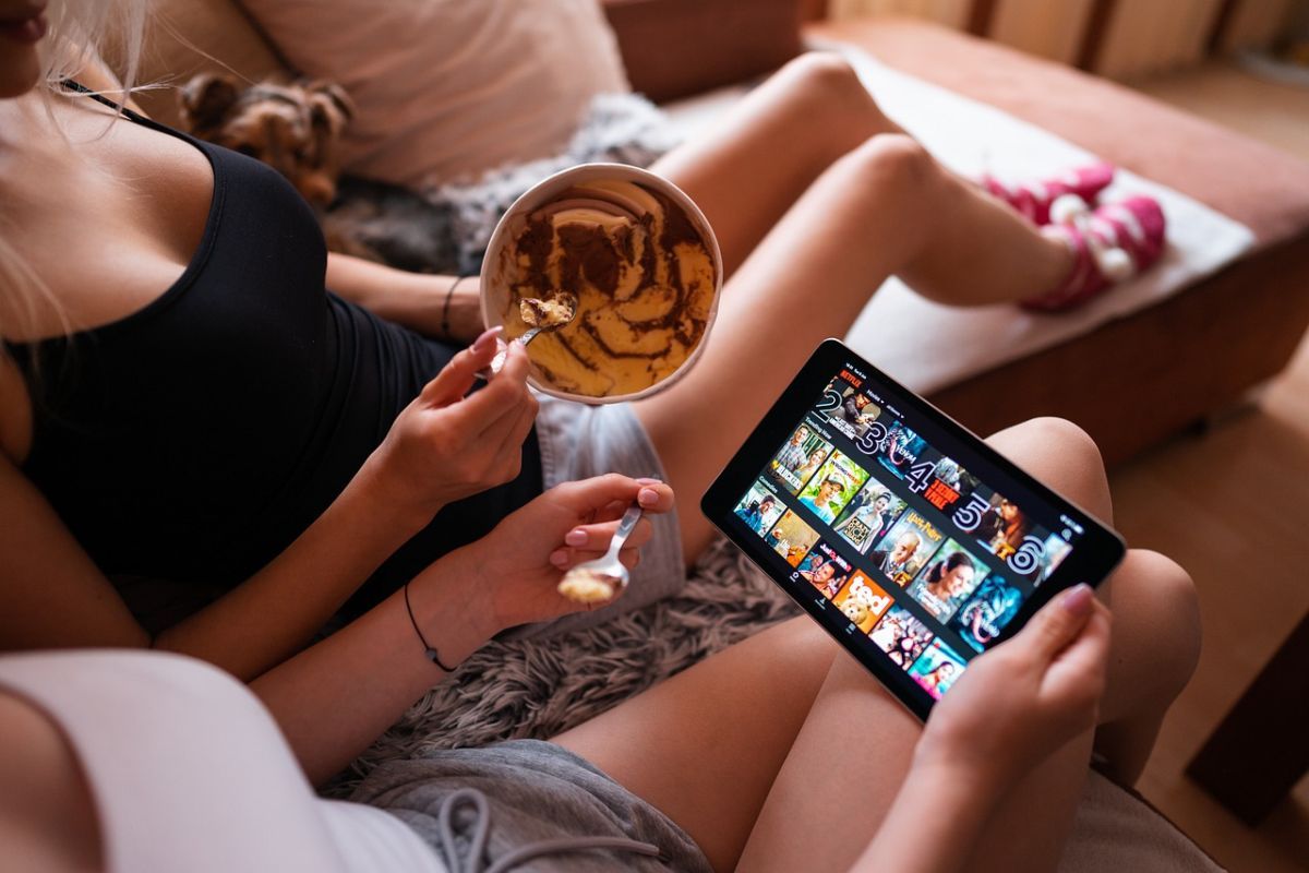 Women watching Netflix on tablet
