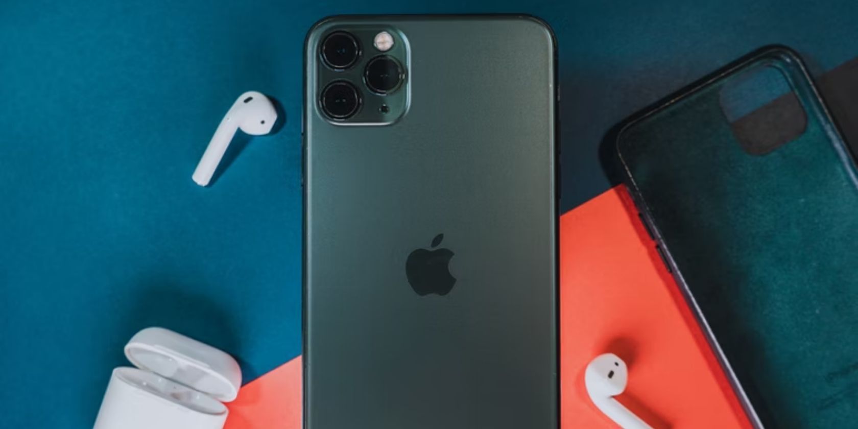 black iphone pro and airpods