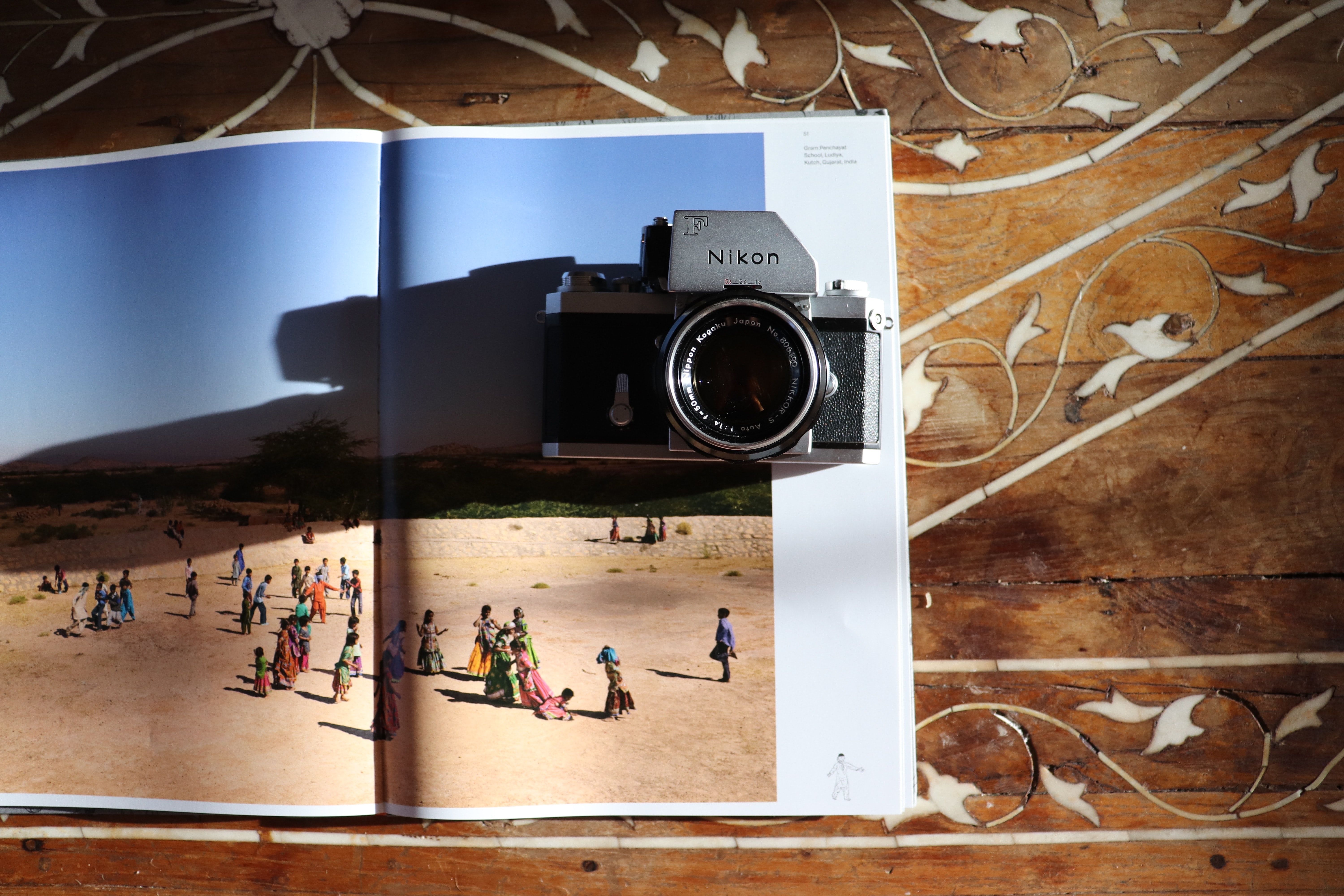 photo of a camera on a book