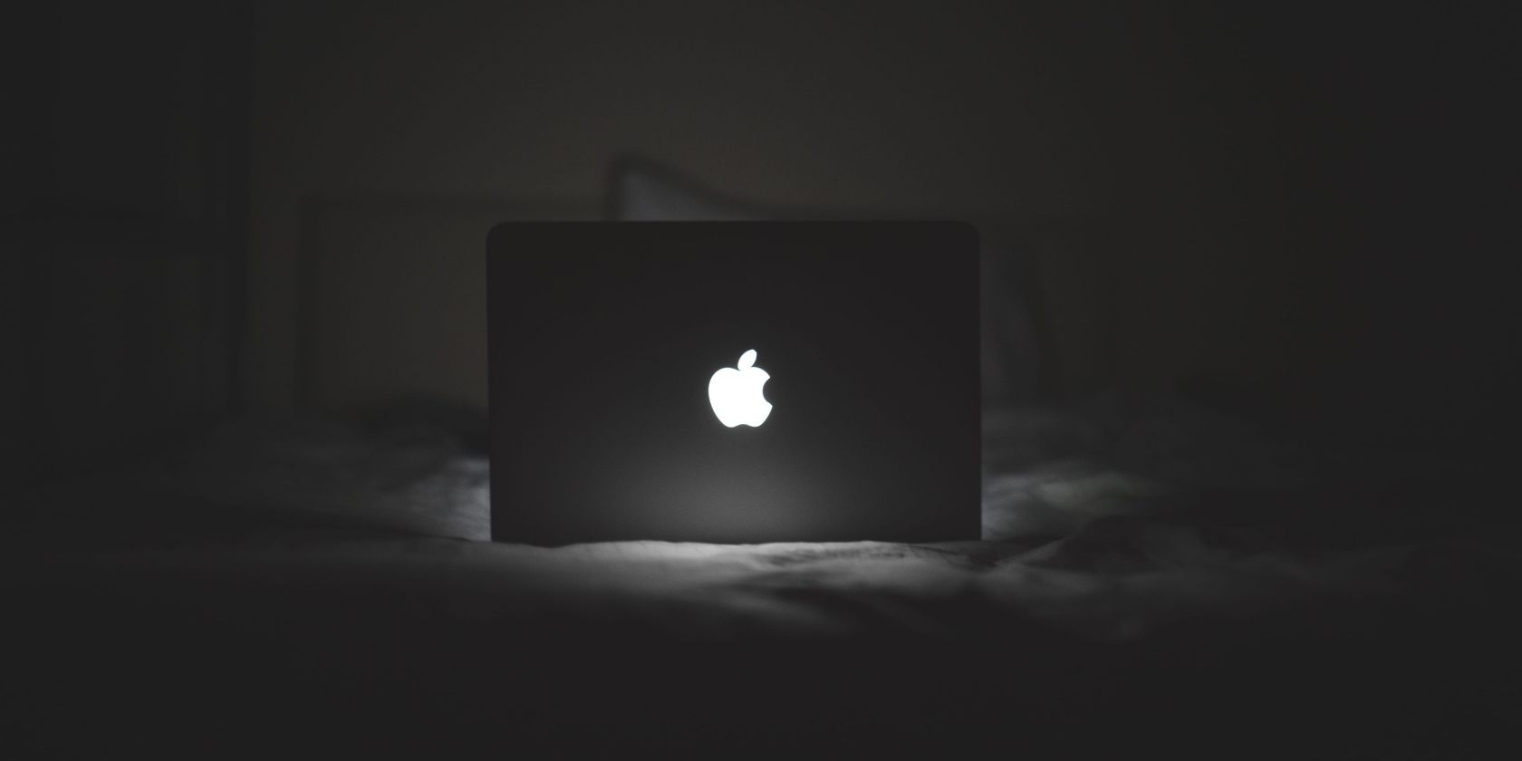 MacBook with a lit Apple logo.
