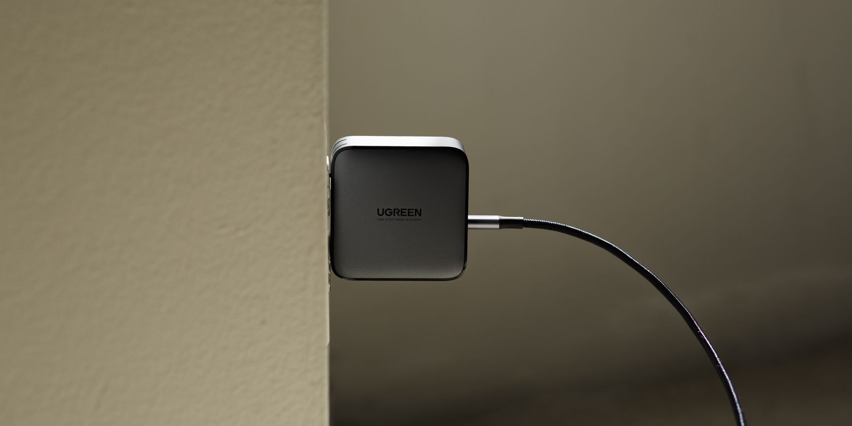 A UGREEN GaN wall charger and USB-C cable.