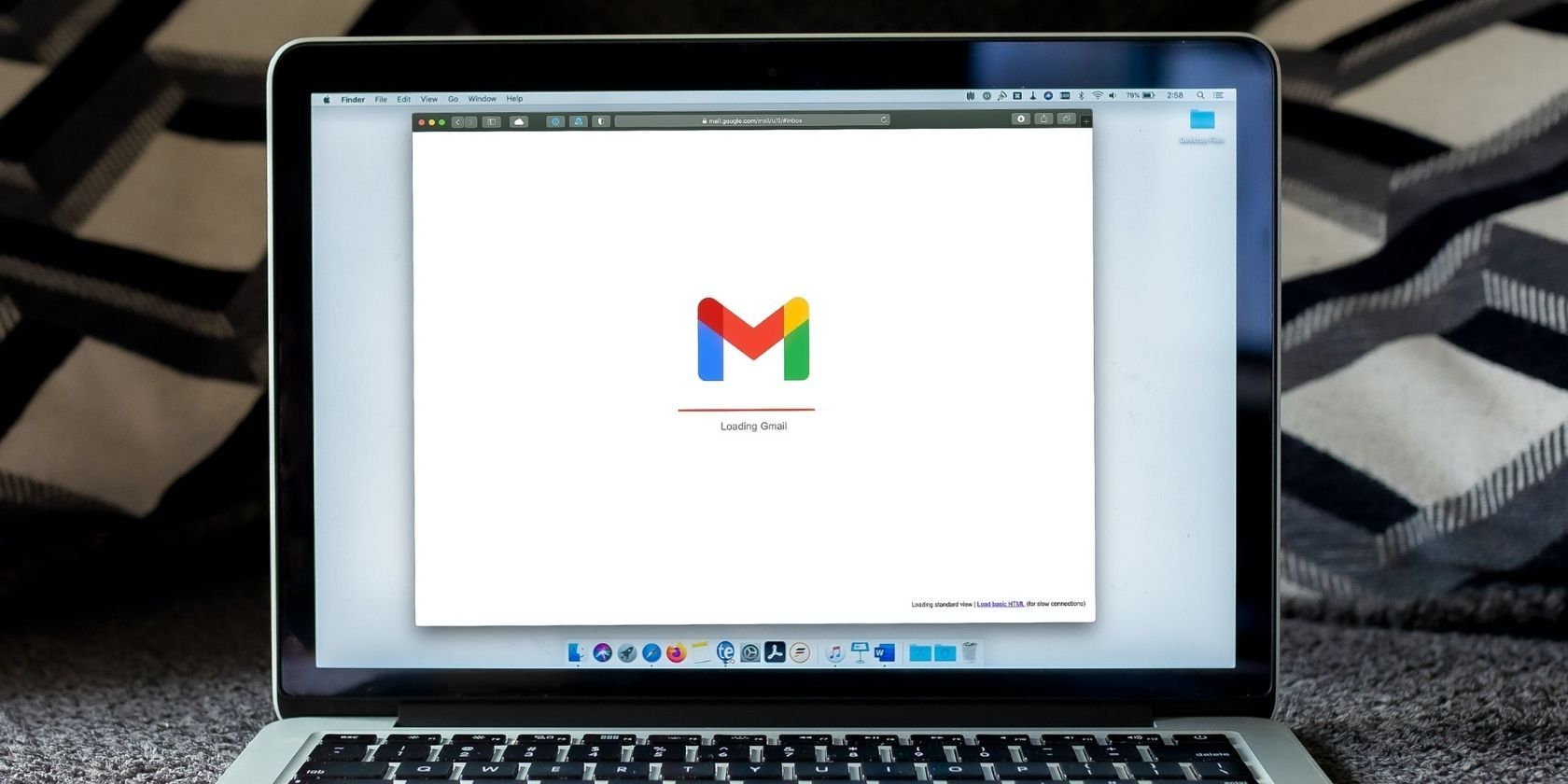 Gmail loading up on a silver mac laptop