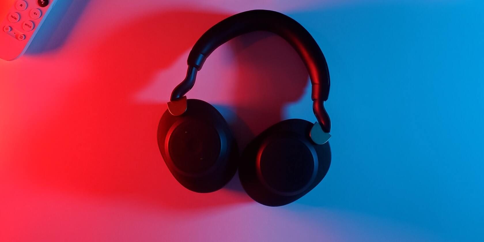 Image of headphones on a red and blue background