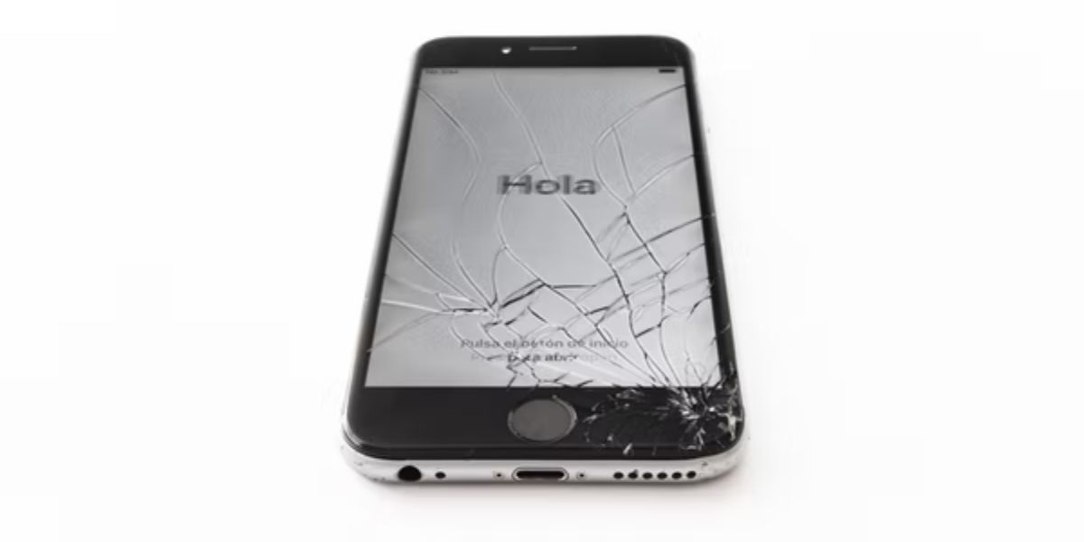 black iphone with cracked screen 