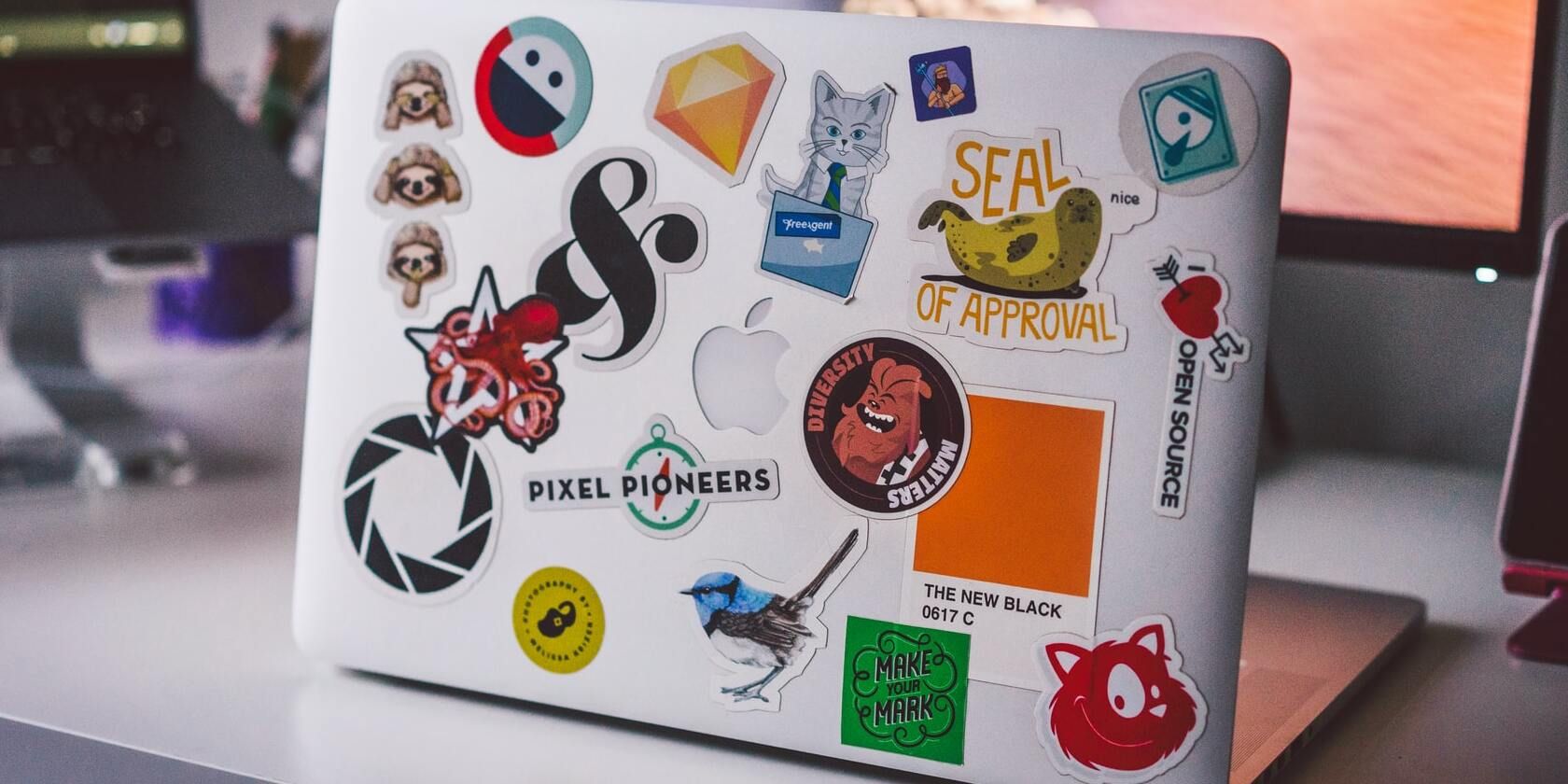 Image showing stickers on the back of a laptop