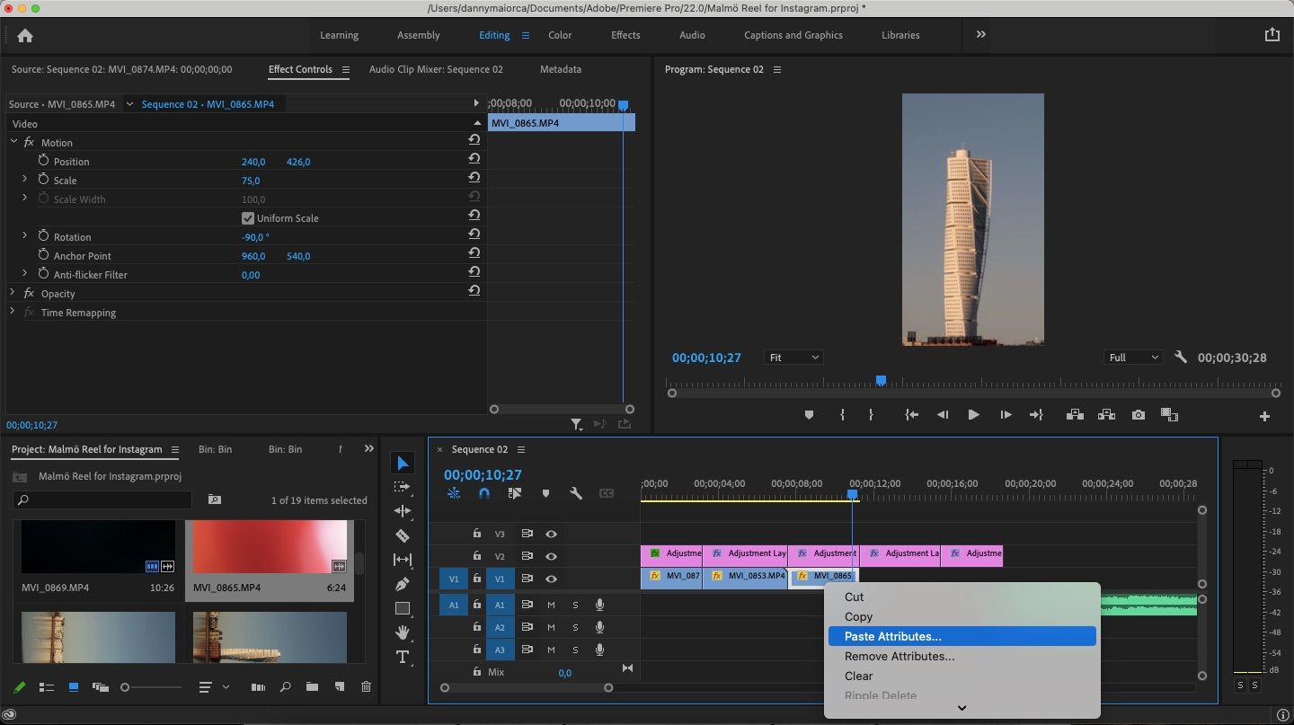 screenshot showing the paste attributes button in premiere pro
