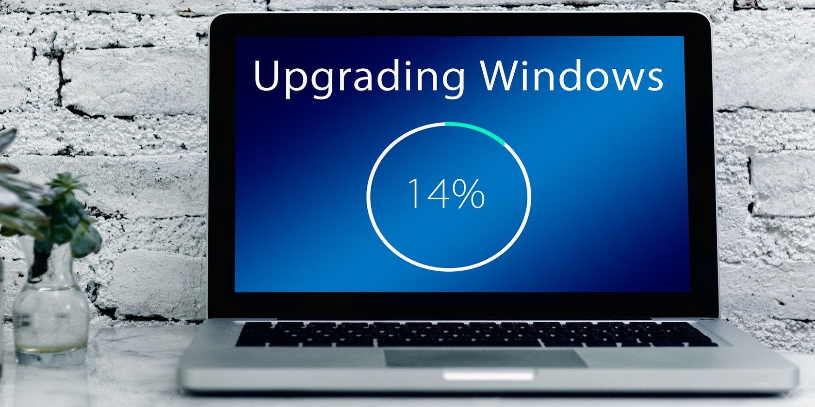 a laptop showing upgrade progress