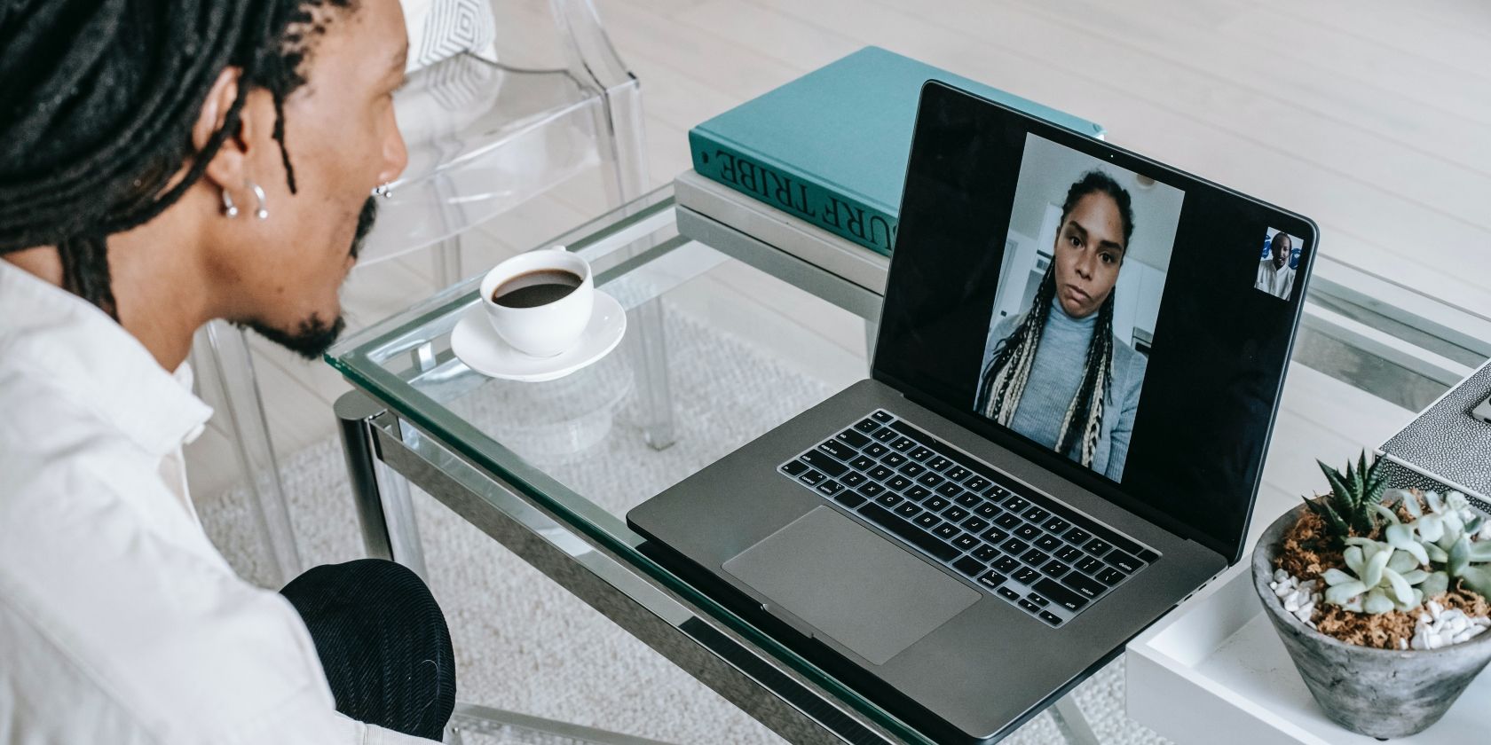 A black guy on a video call with woman
