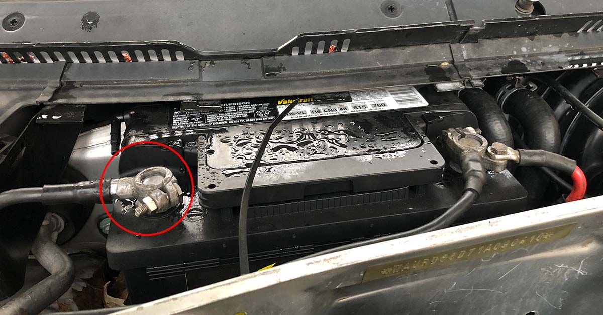 Disconnecting the ground cable from the car battery.
