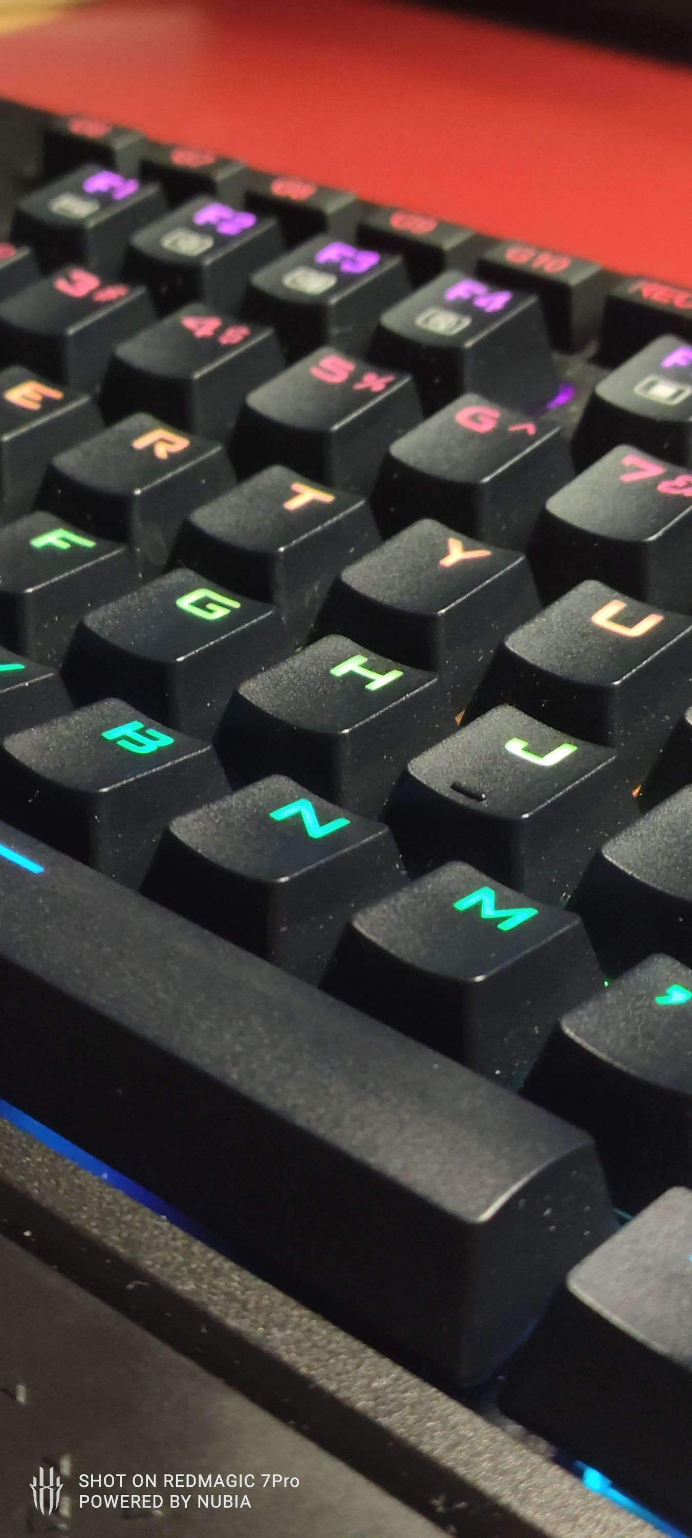 keys on a Redragon keyboard photographed with the Redmagic 7 Pro