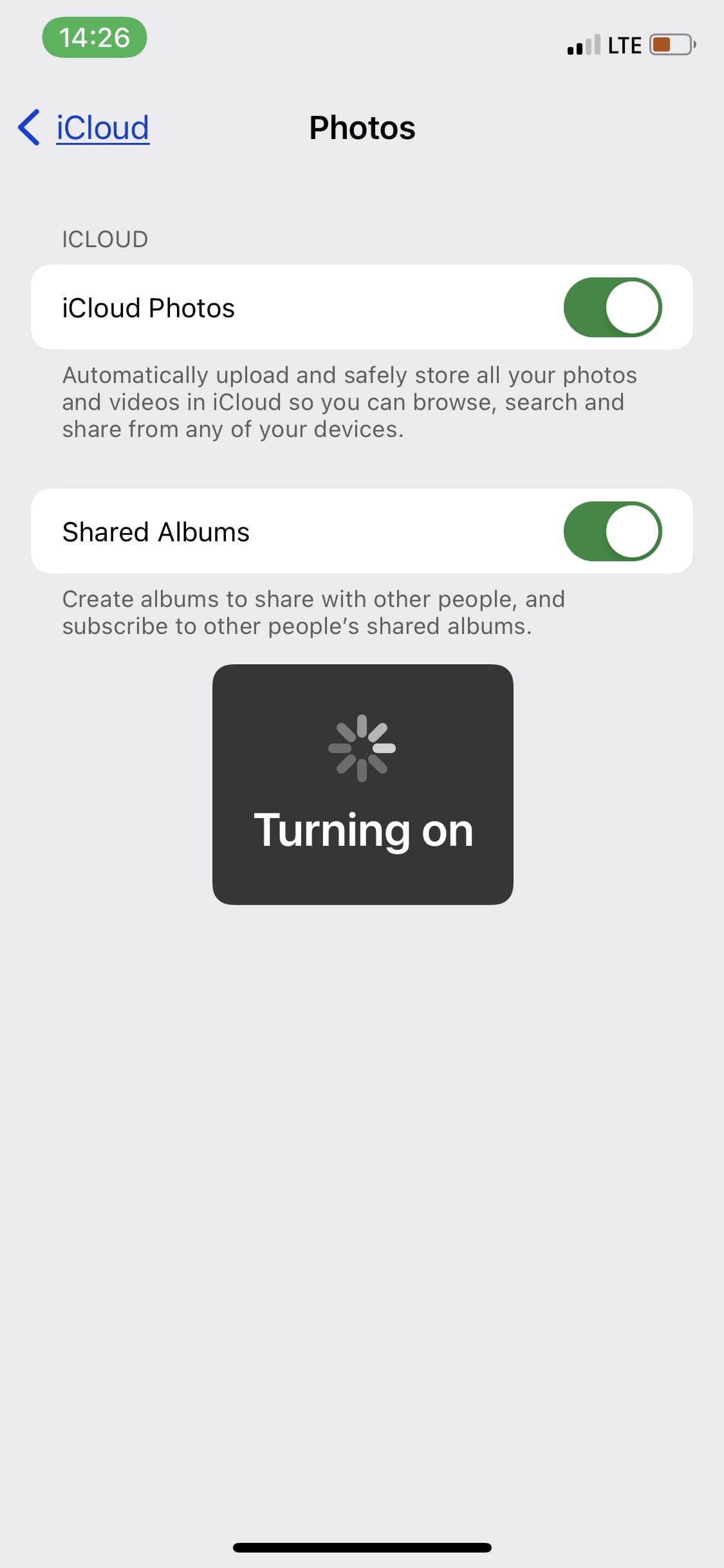 iPhone settings page showing iCloud Photos switch toggled on