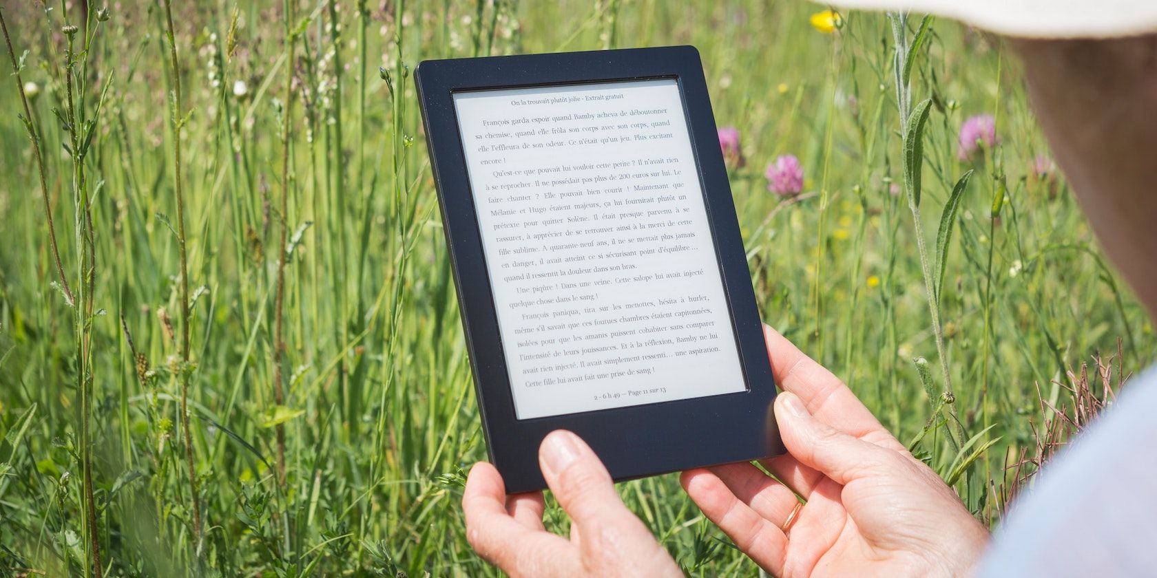 Person Holding Kindle eReader Featured Image