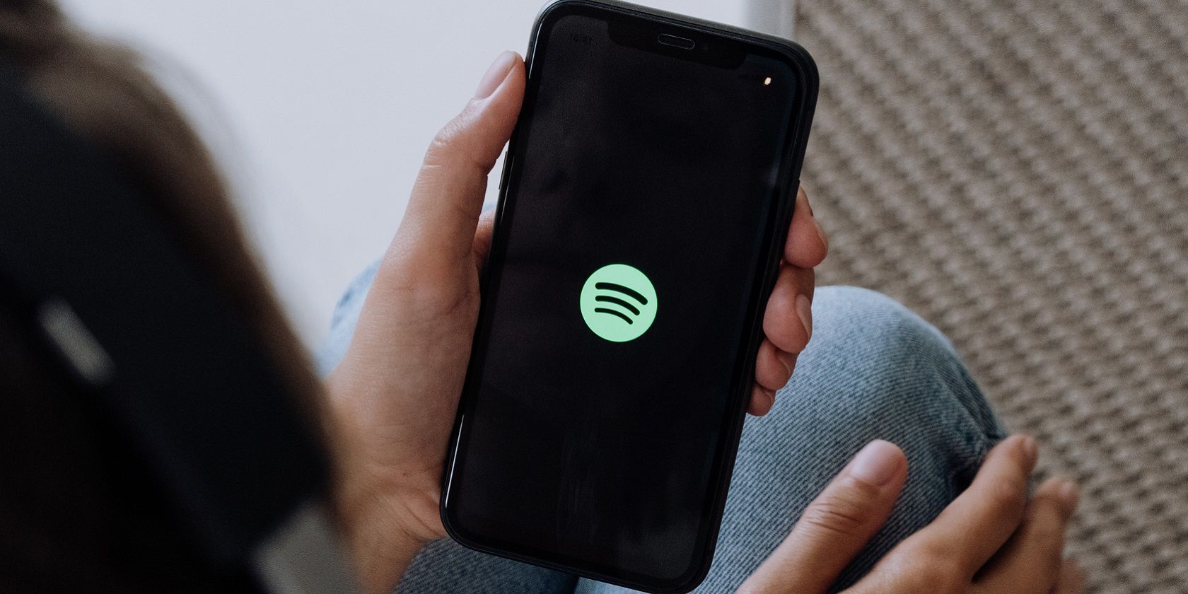 Spotify logo on phone screen