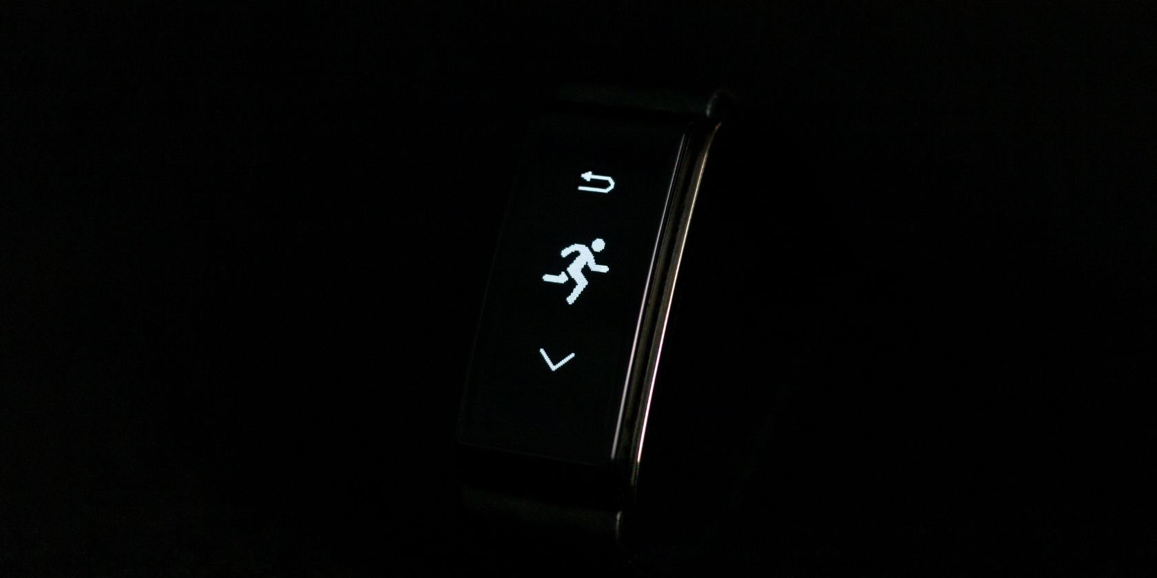 Fitness tracker with graphic of person running