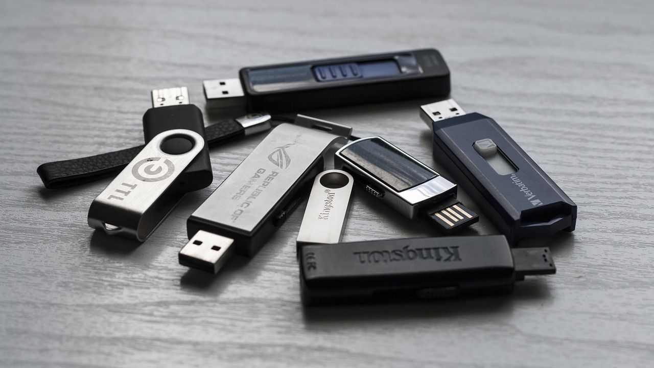 gray and black USB flash drives
