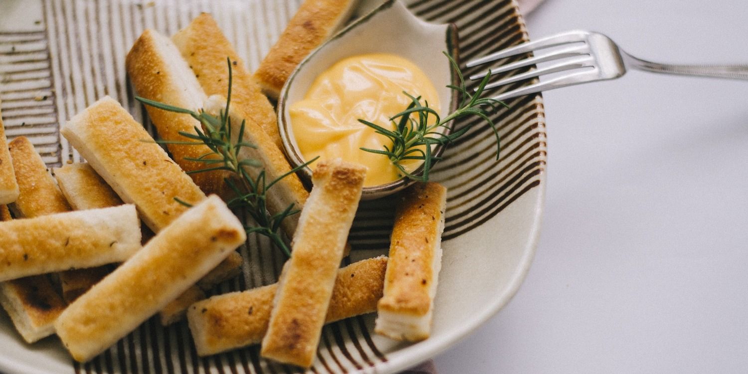 bread and dip on a plate