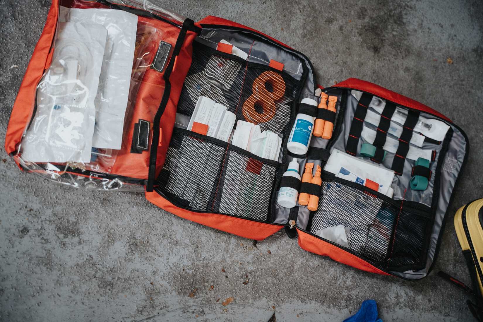 first aid kit on the ground