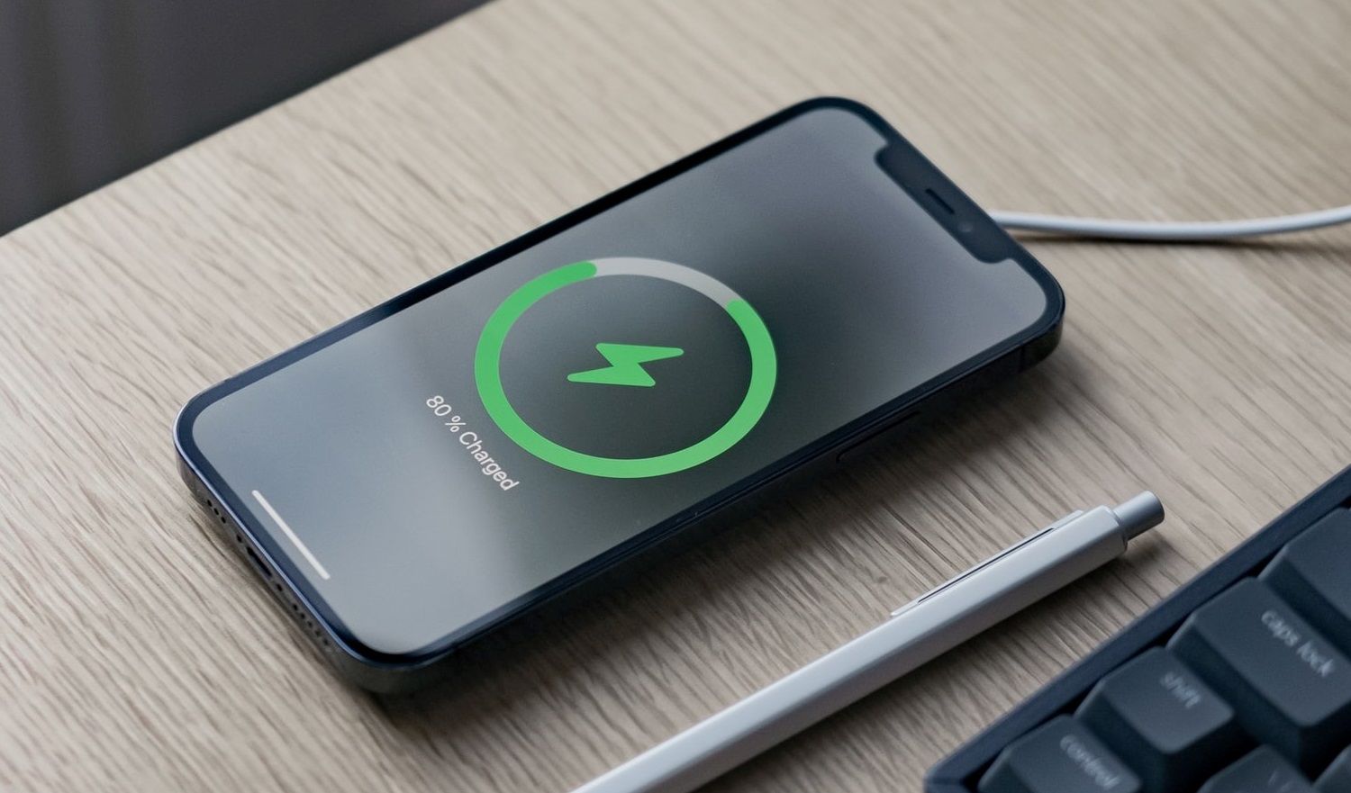 Photo of an iPhone charging wirelessly