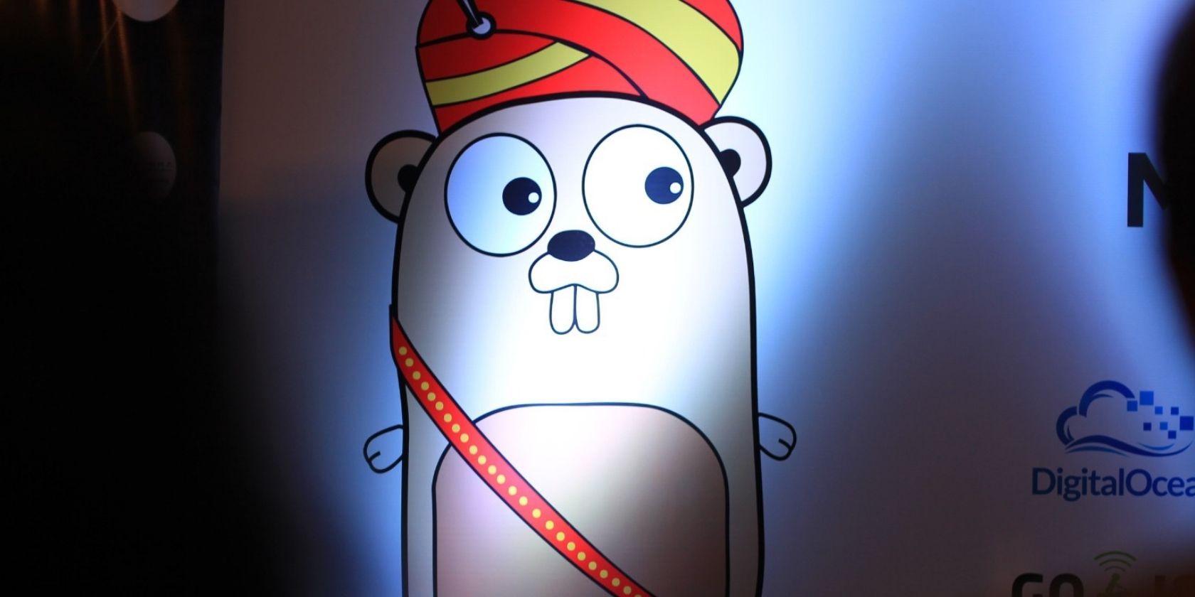 The Golang mascot, a cartoon gopher with prominent teeth and large eyes