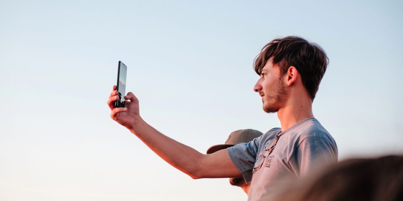 person taking a selfie with a phone