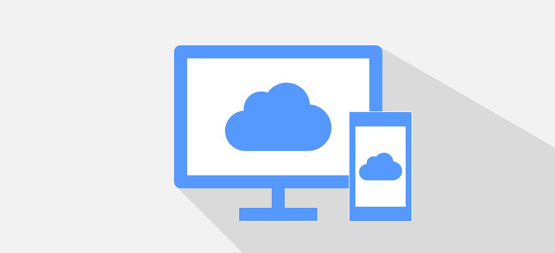 A phone and computer monitor with the cloud storage icon