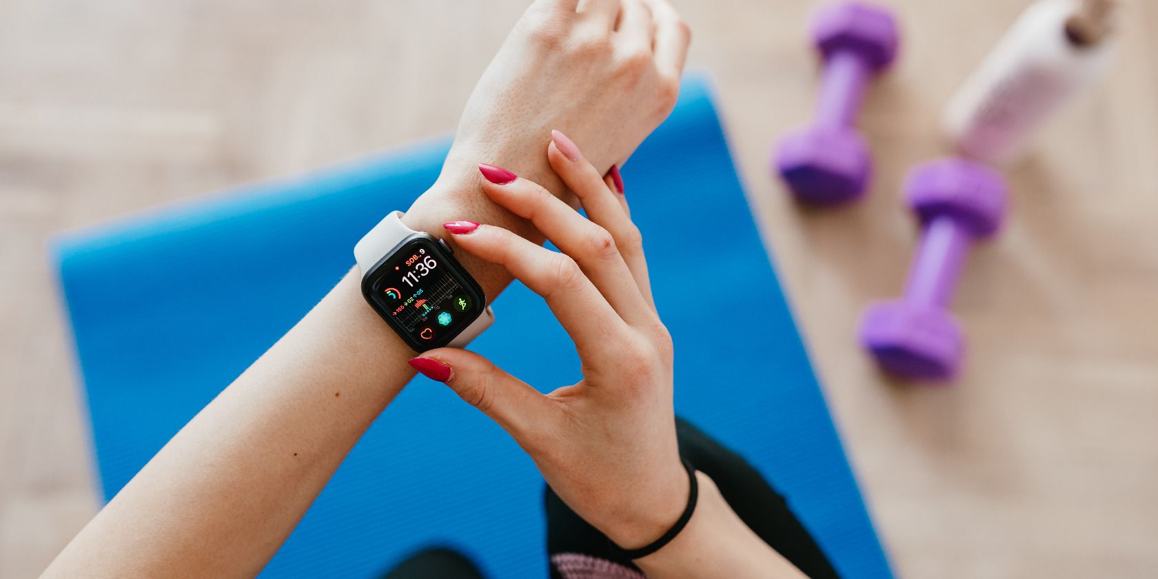 Person wearing smartwatch during fitness workouts
