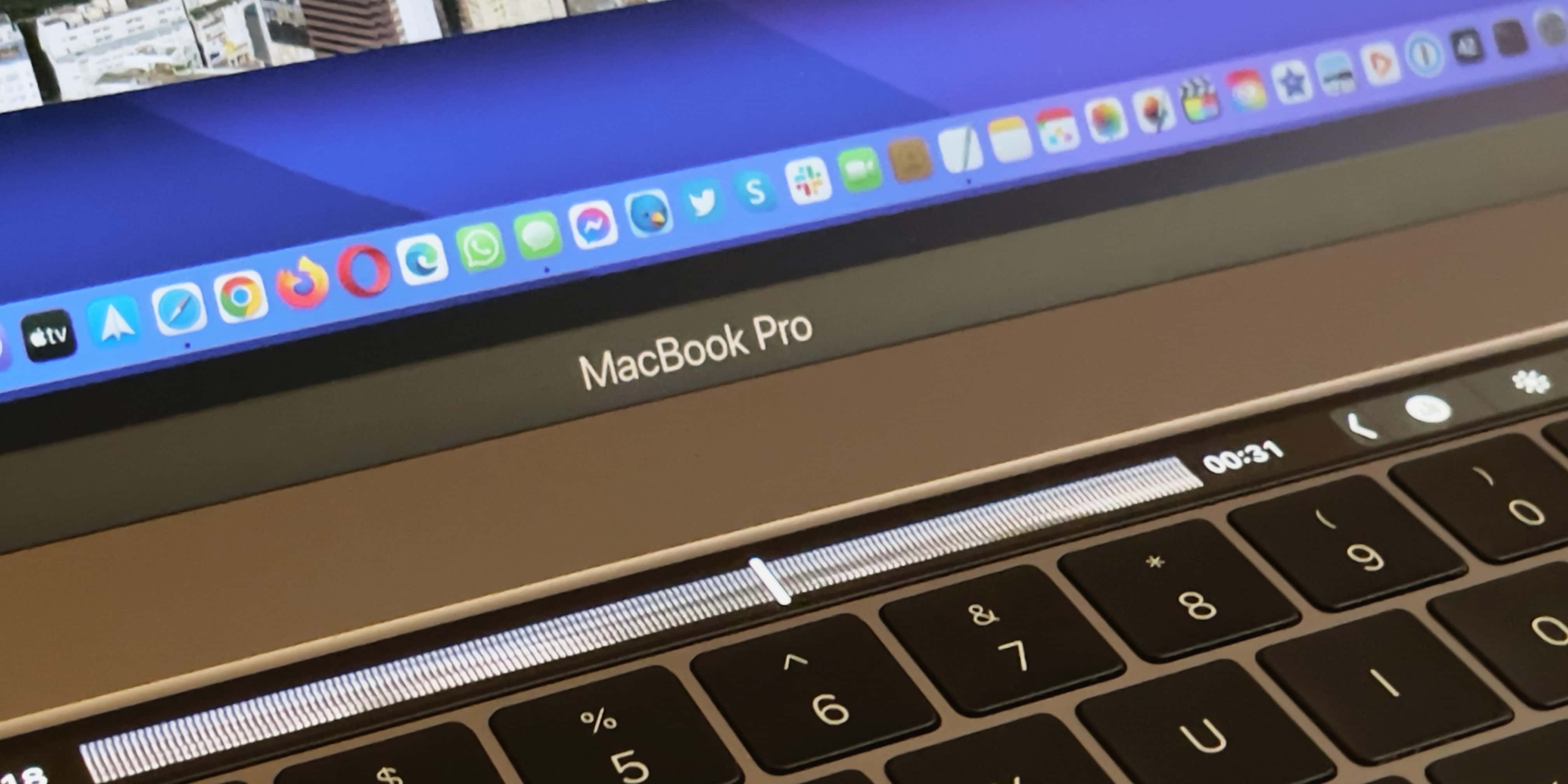 A closeup of Apple MacBook Pro's Touch Bar showcasing the scrubber control for QuickTime Player