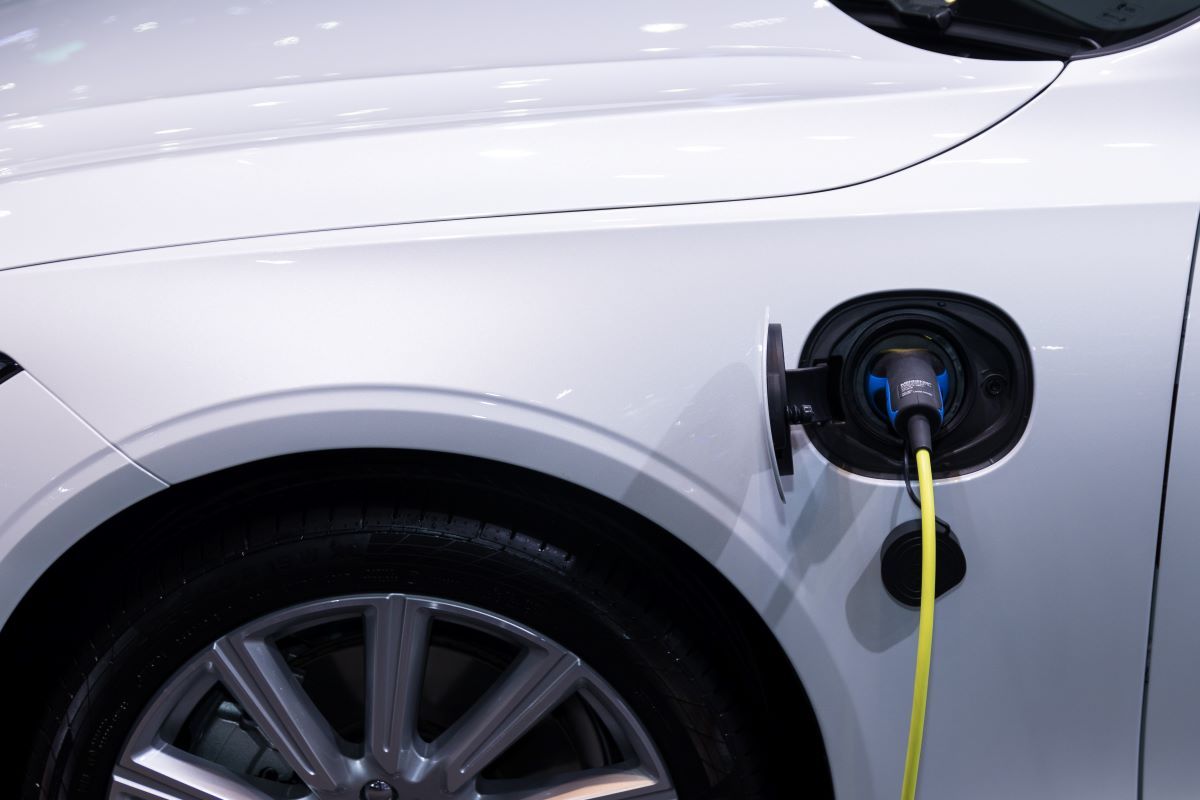 Electric vehicle connected to a charger
