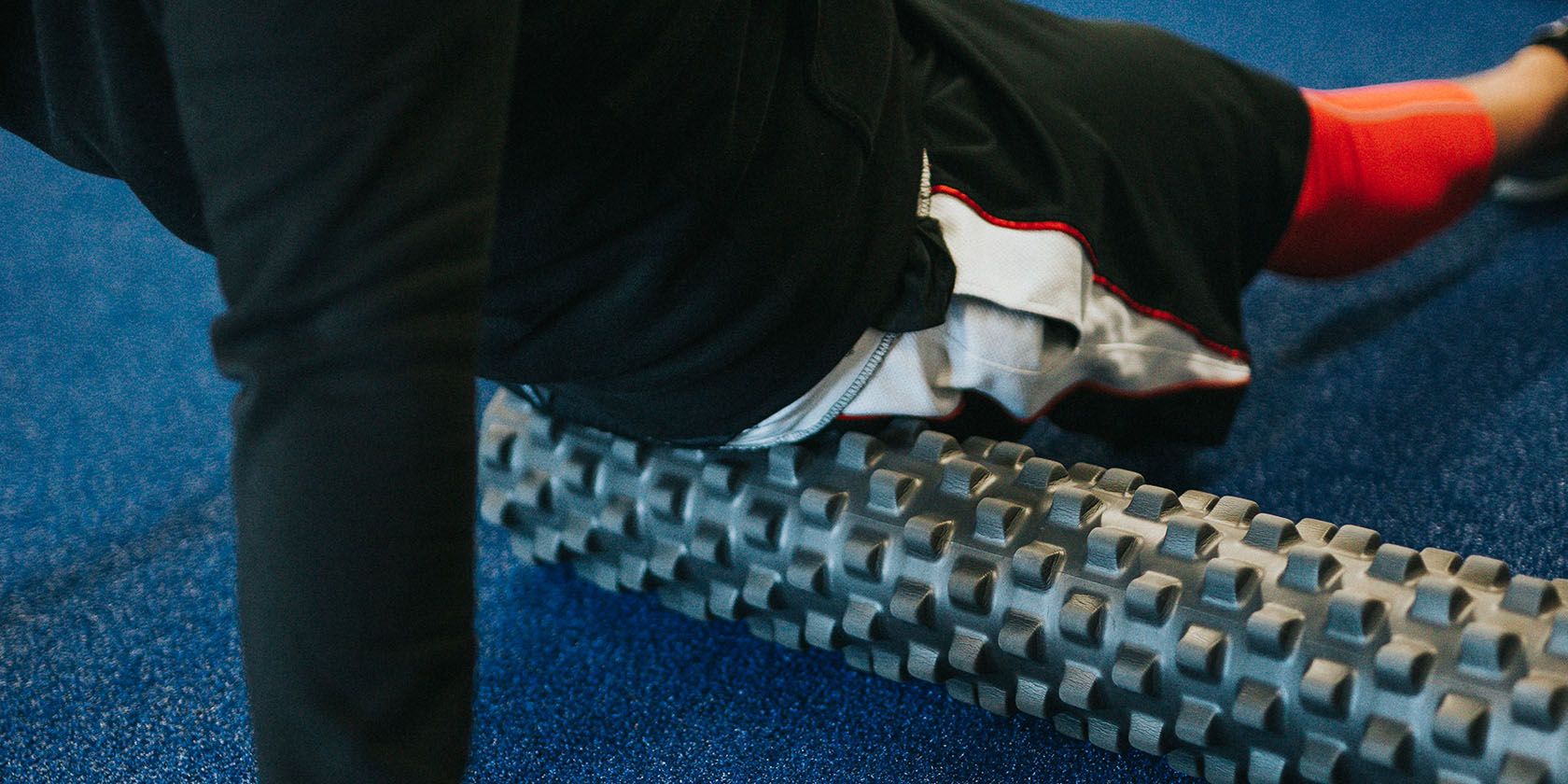 Photo of a person using a foam roller