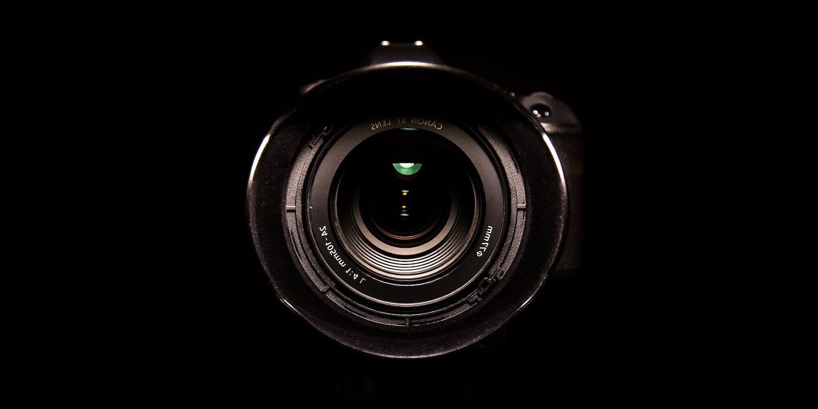 Closeup of a lens on a black background