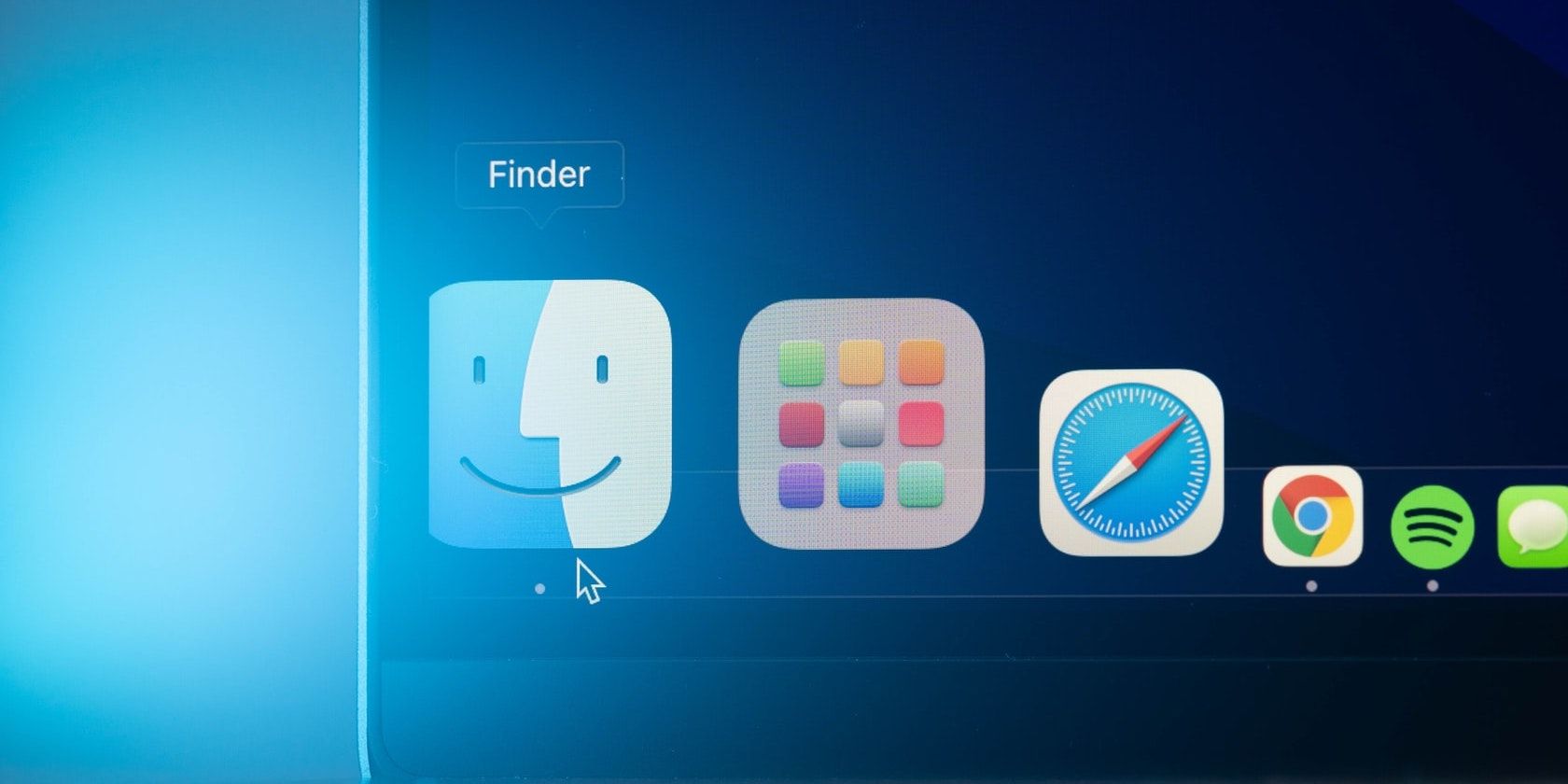 Mouse pointer over the Finder icon in Mac's Dock