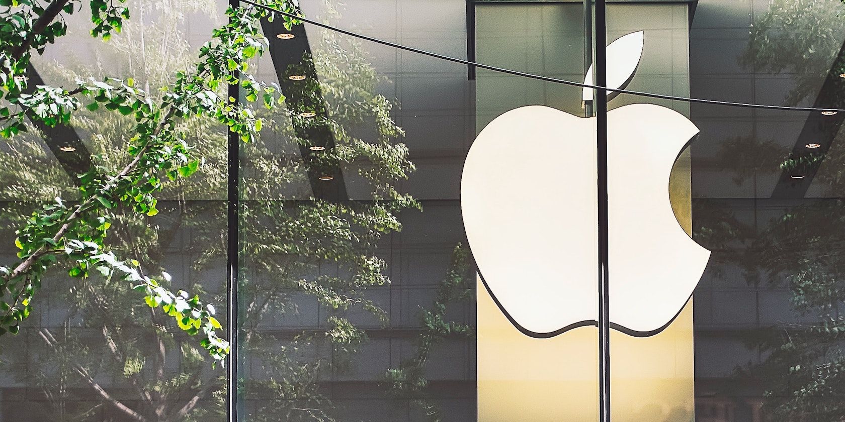 apple logo behind glass window