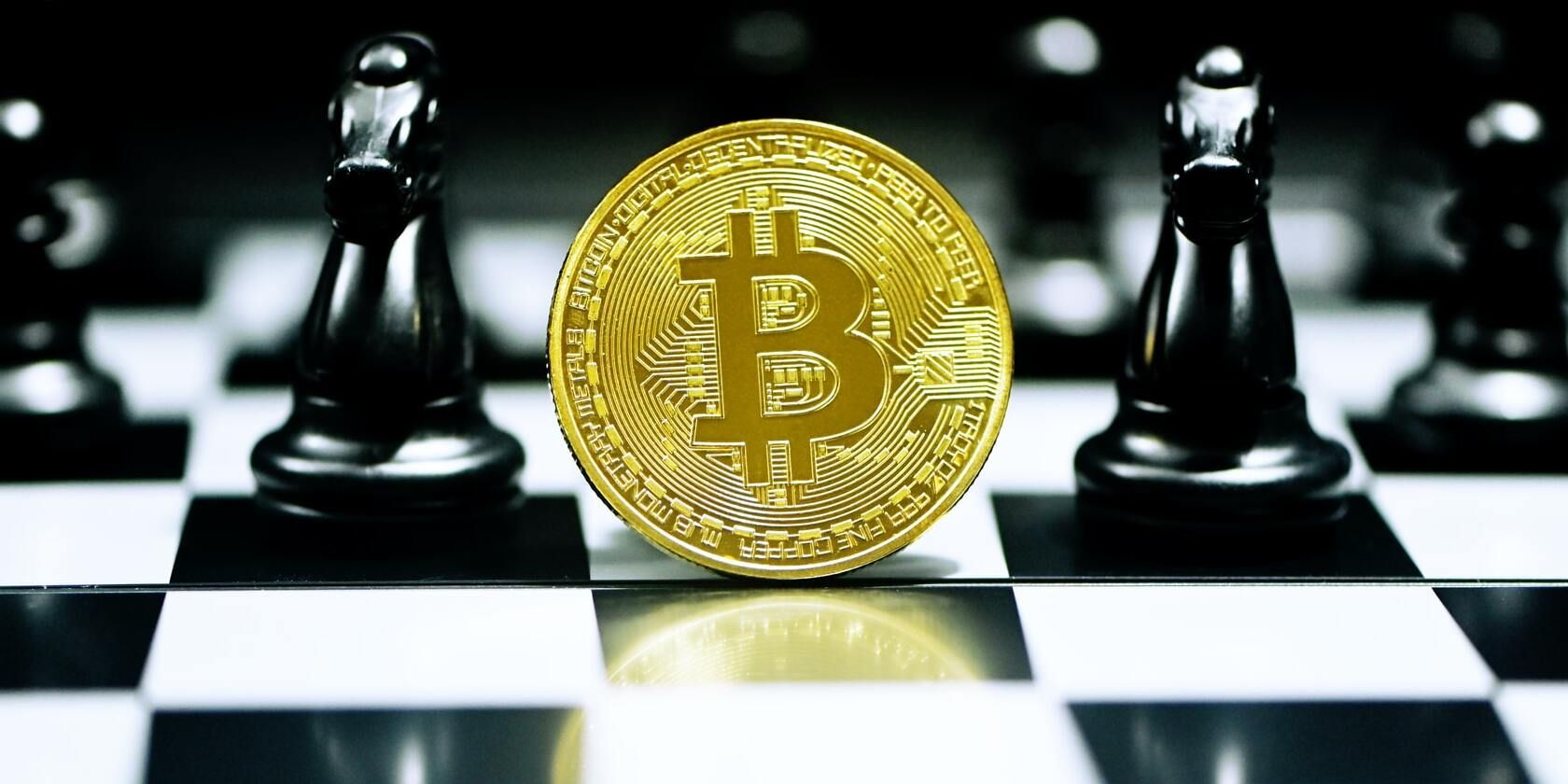 Image of a Bitcoin on a chessboard