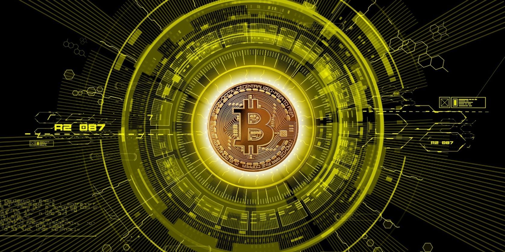 gold bitcoin surrounding by yellow digital graphic