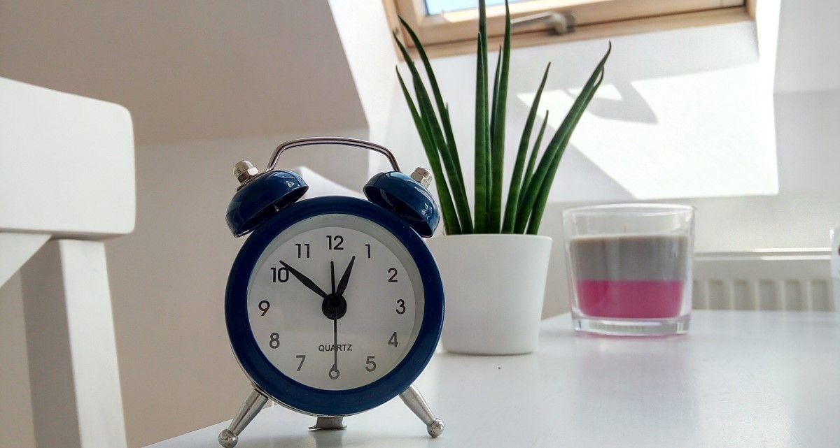 blue-clock-on-table