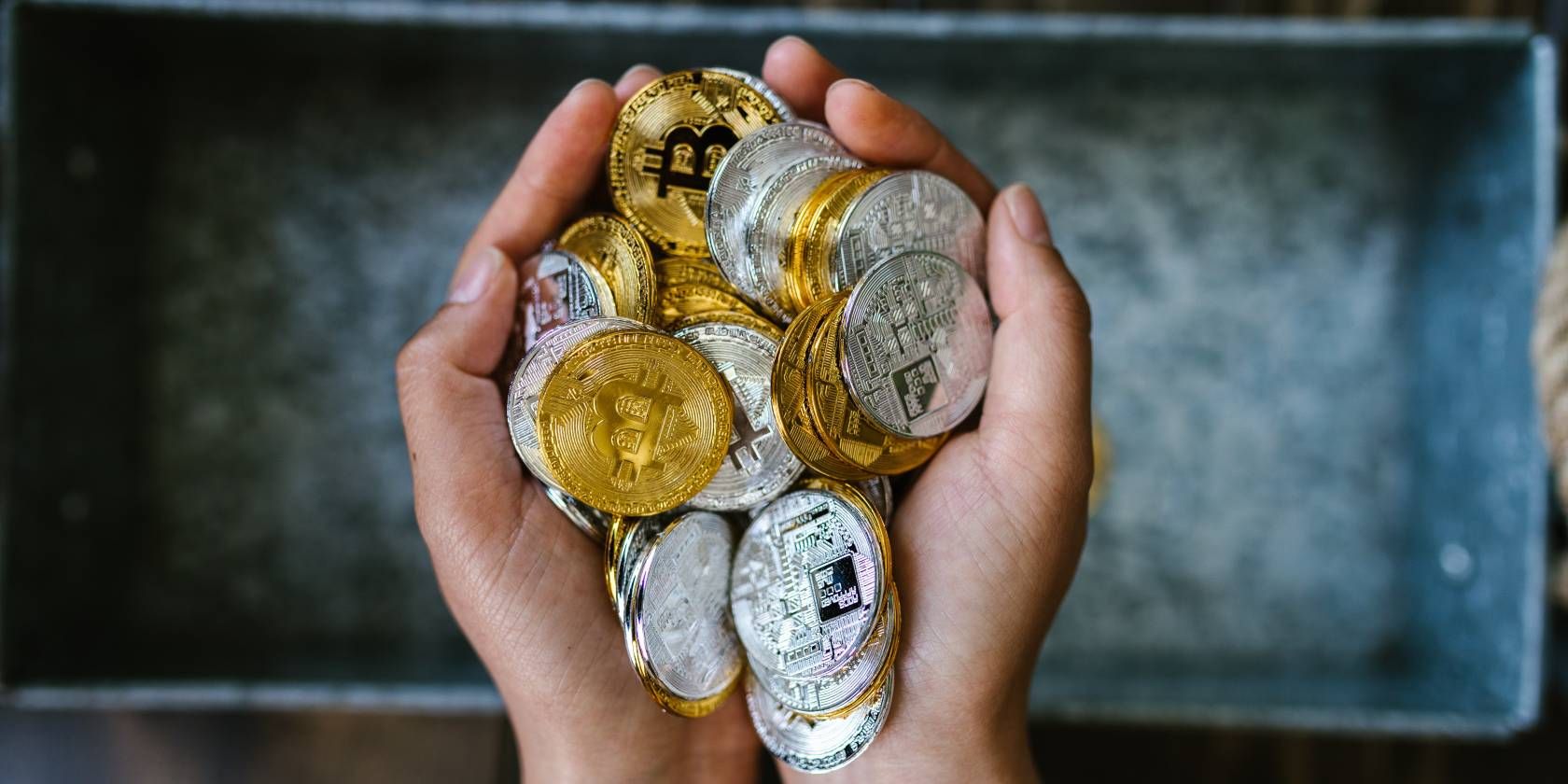 crypto coins in hands