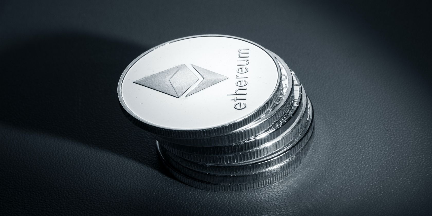 stack of silver ethereum coins