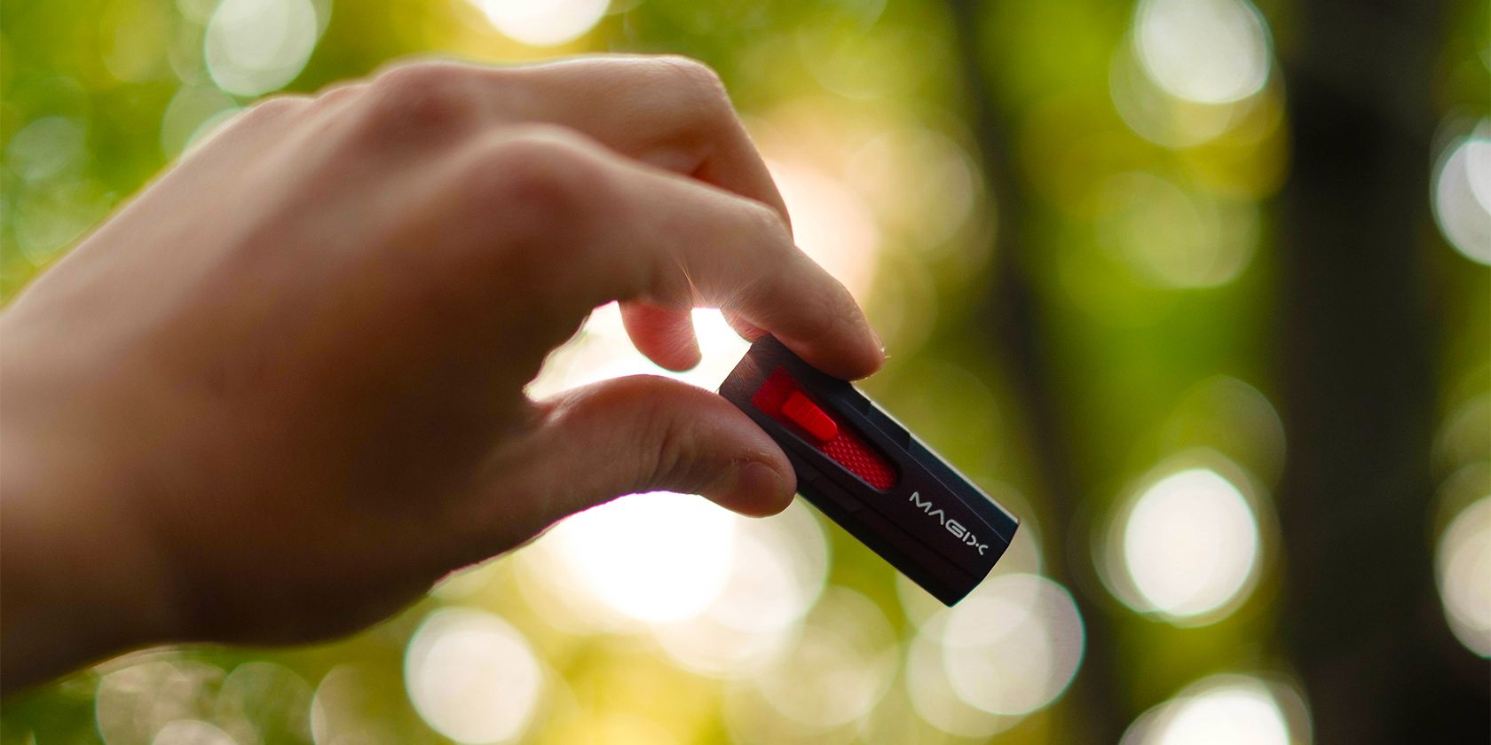 holding a USB flash drive for use with a smartphone