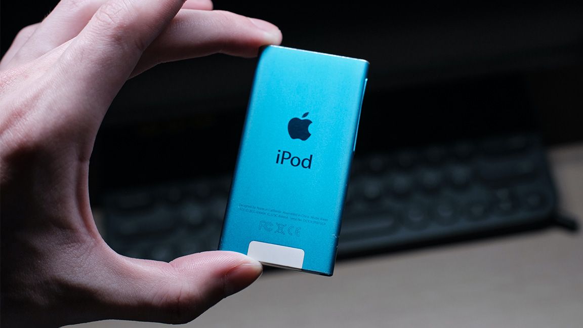 Holding Blue iPod