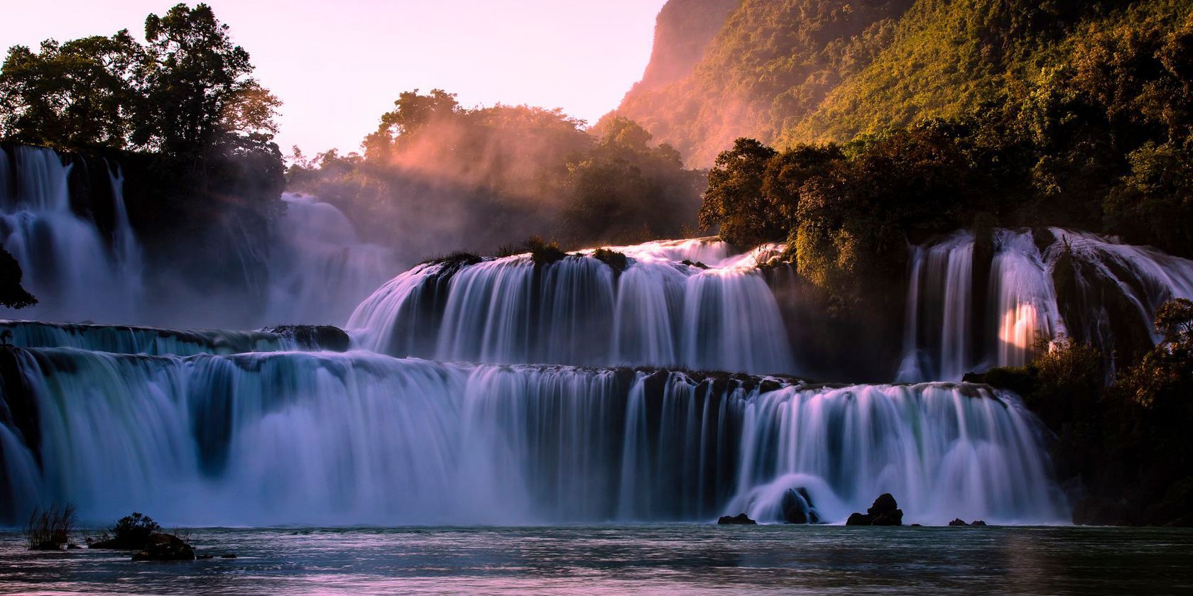 image showing waterfalls in gentle sunlight