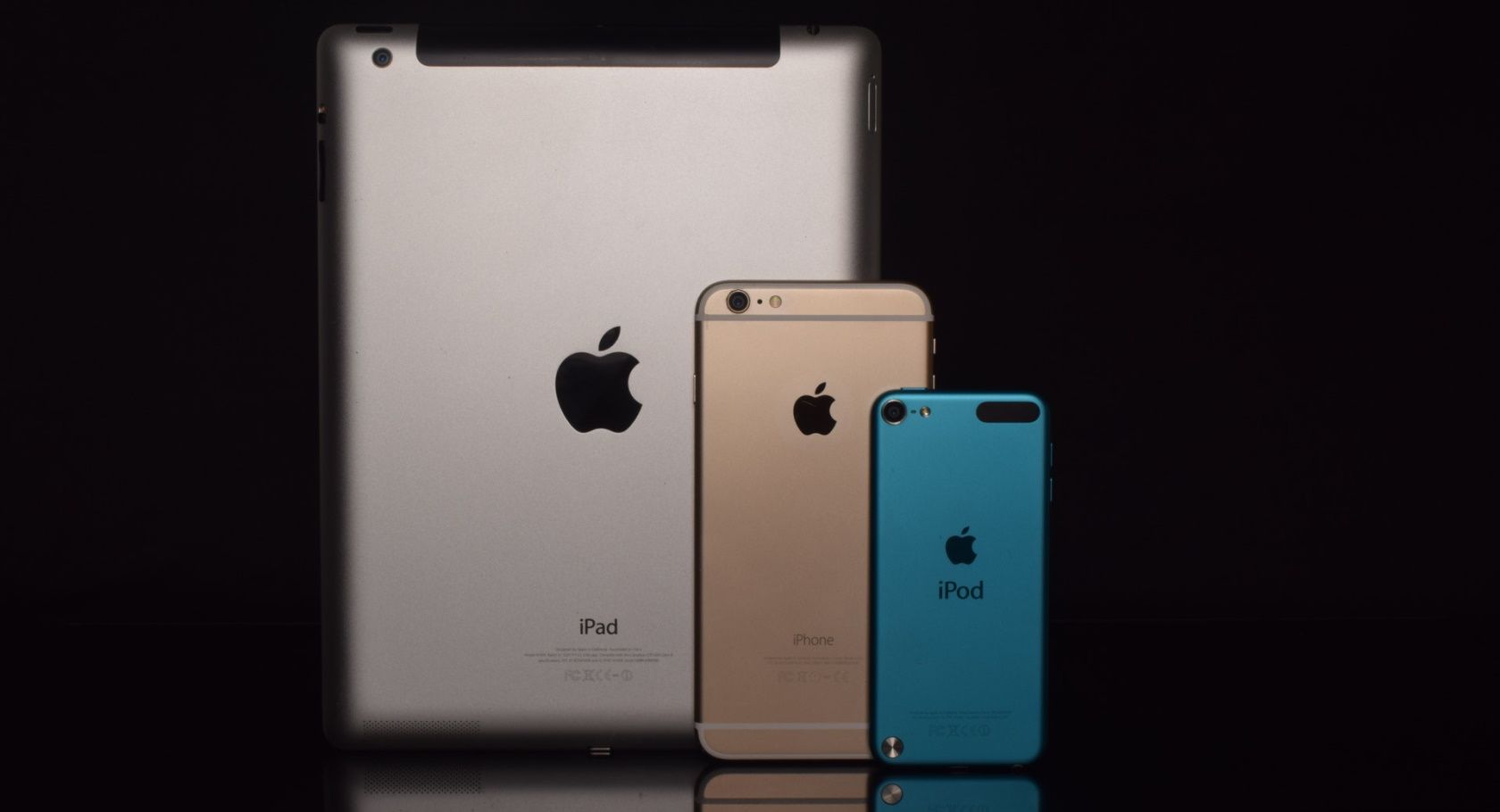 iPod Touch, iPhone, and iPad next to each other