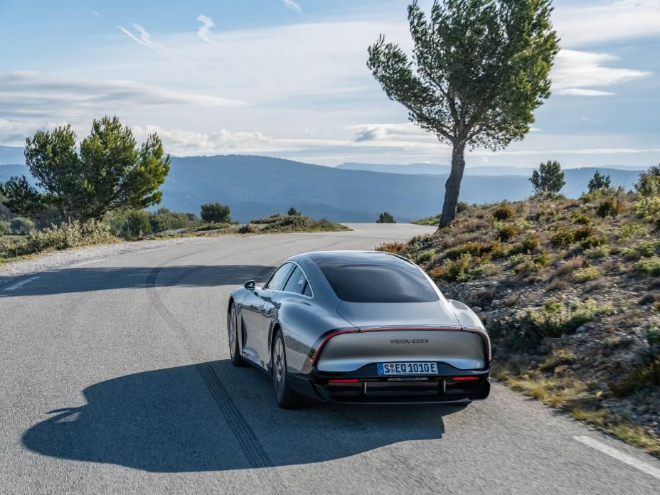 mercedes vision eqxx concept electric vehicle ev rear driving on road