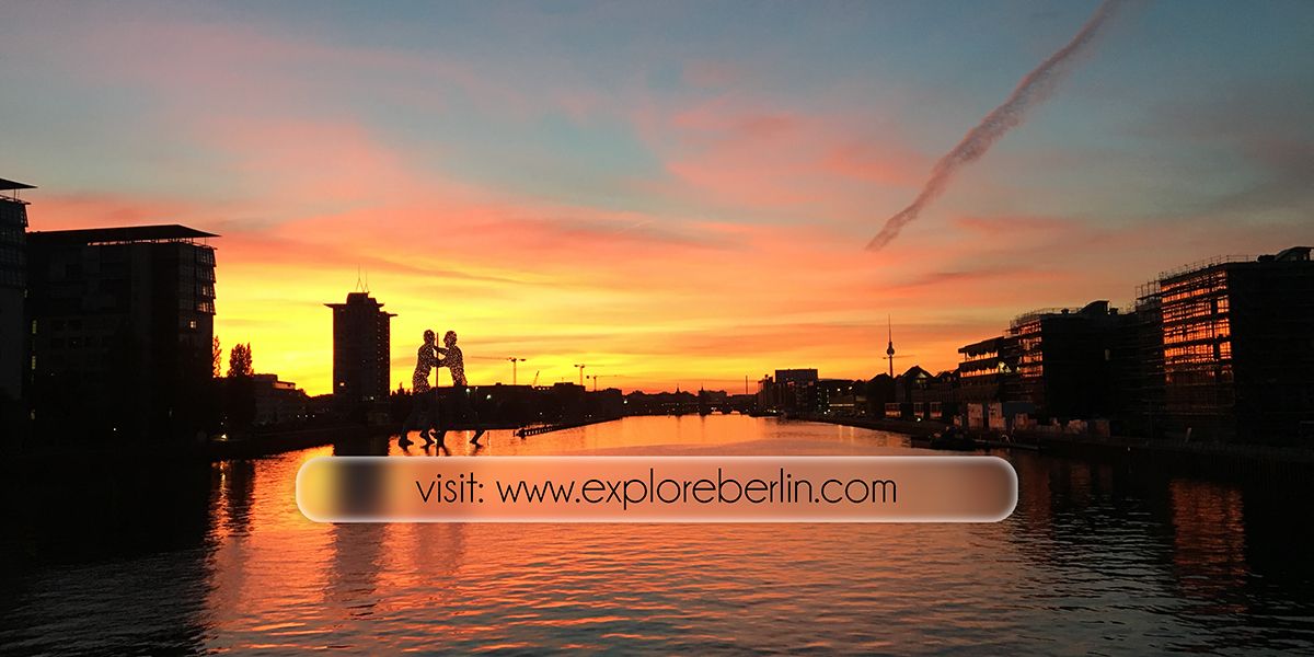 Sunset photo of river in Berlin with a blurred search bar with website written in it.