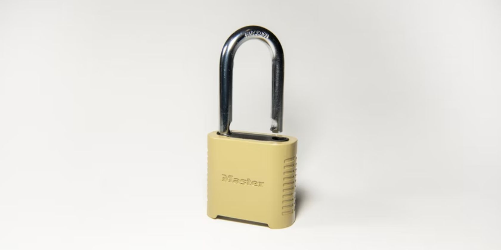 pale yellow padlock against white background