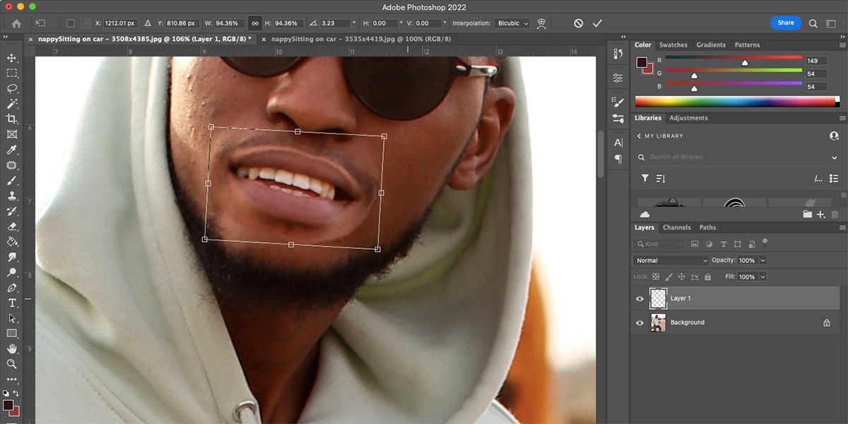 Photoshop interface with transform tool around a man's mouth.