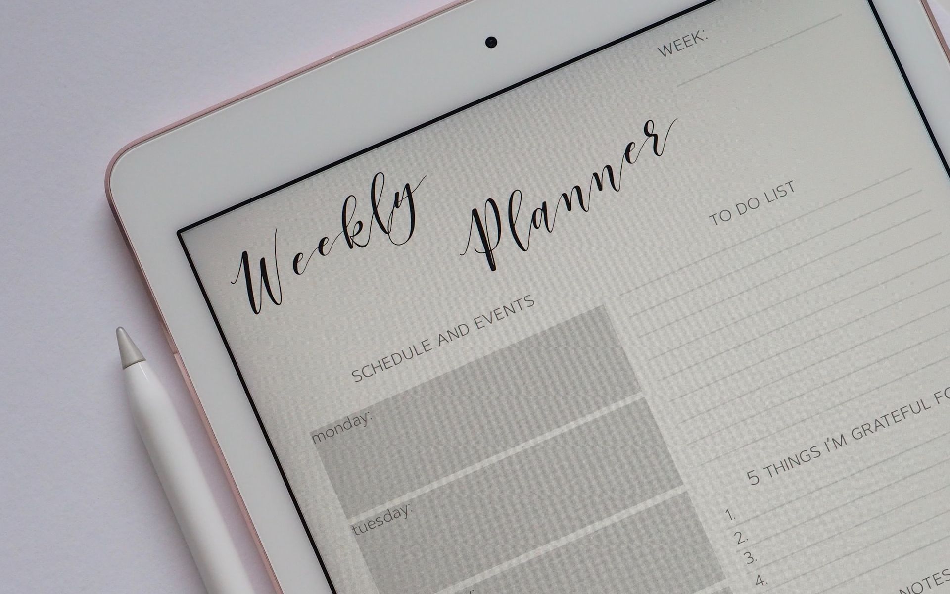 Weekly Work Schedule Planner Open on an iPad